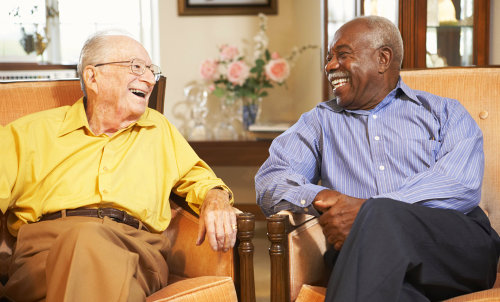 smiling two elderly men